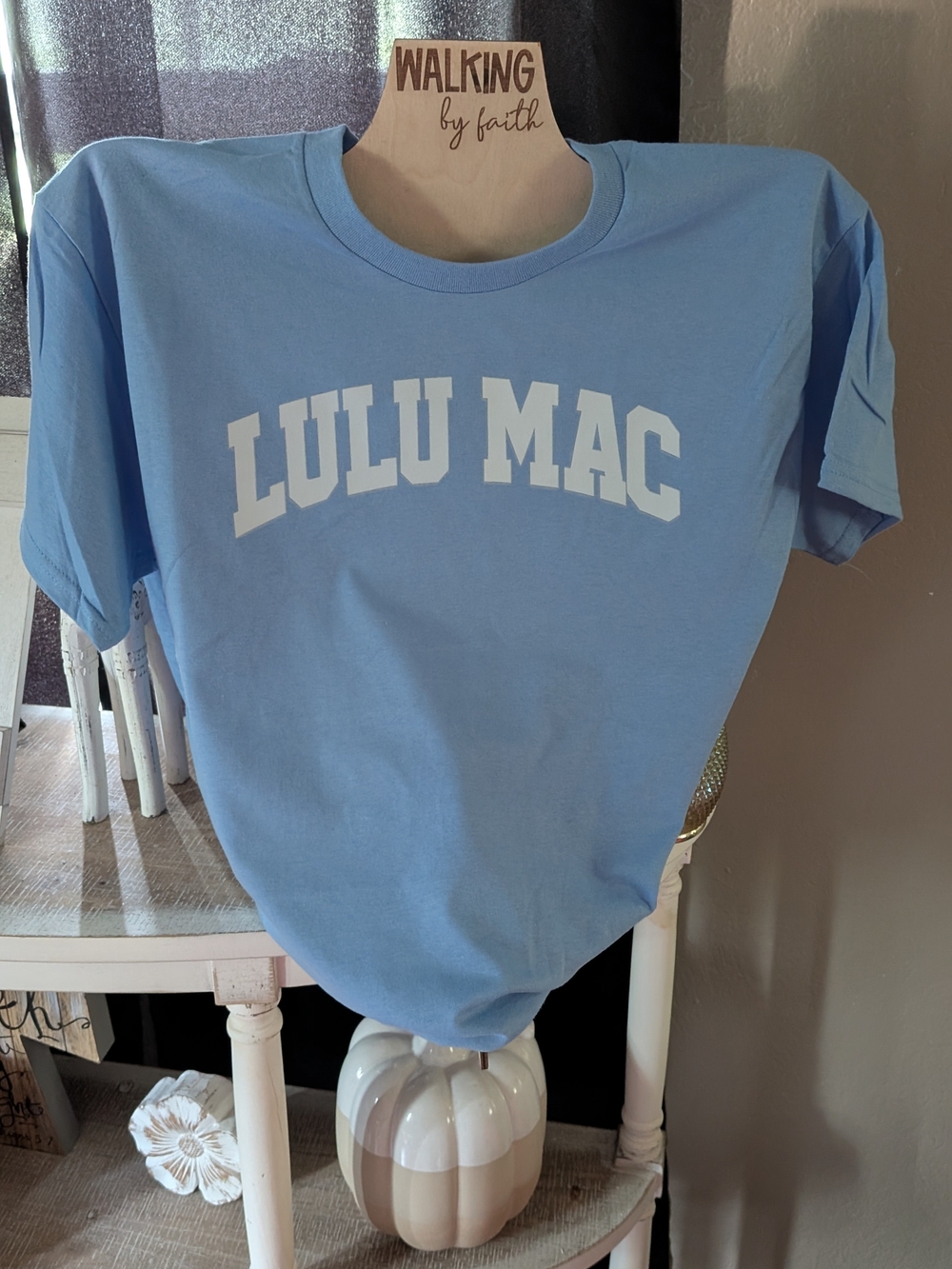 Blue Graphic Tee With White Lettering..